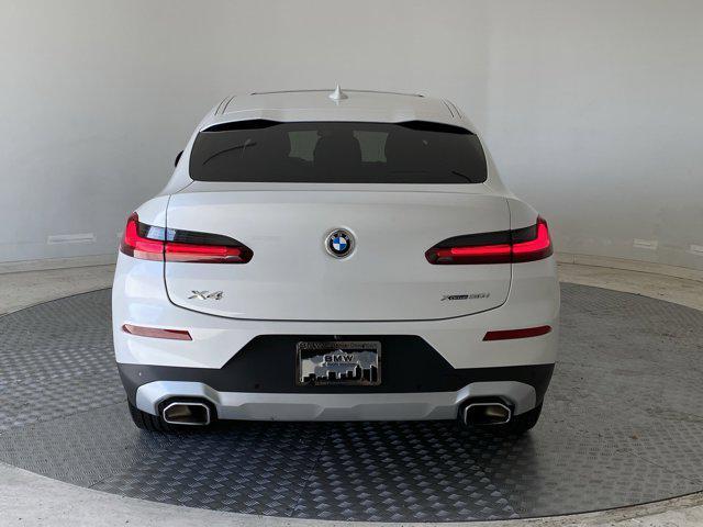 used 2024 BMW X4 car, priced at $45,596