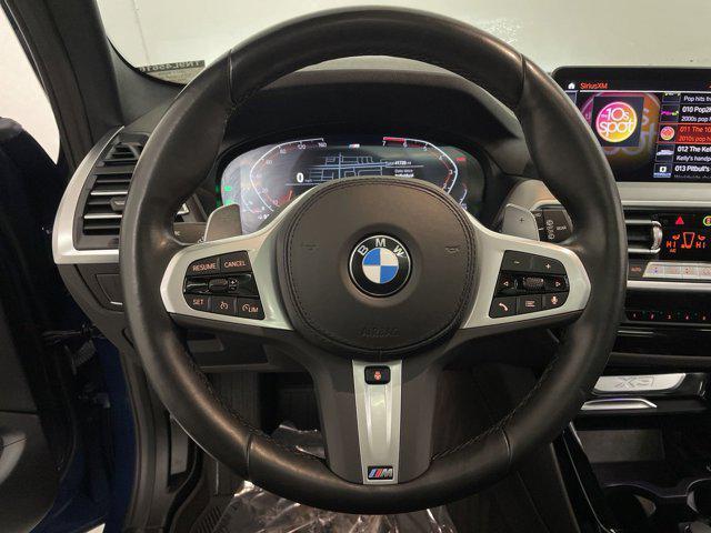 new 2025 BMW iX car, priced at $115,495