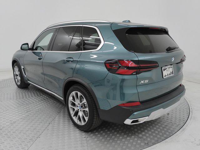 used 2025 BMW X5 PHEV car, priced at $73,981