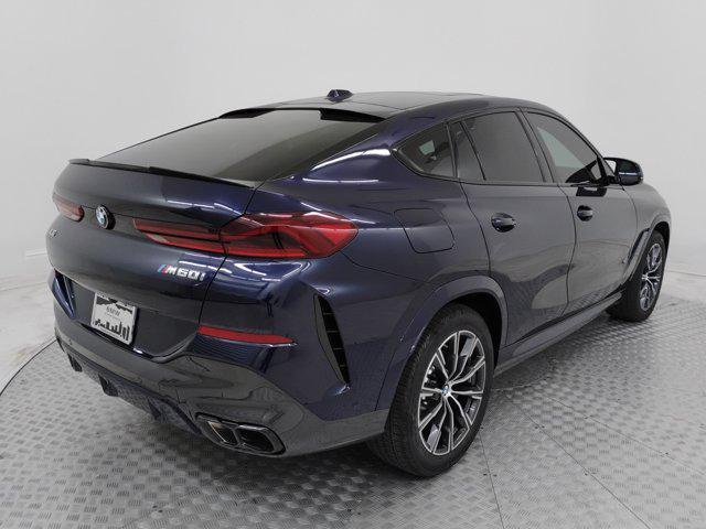 used 2025 BMW X6 car, priced at $90,496