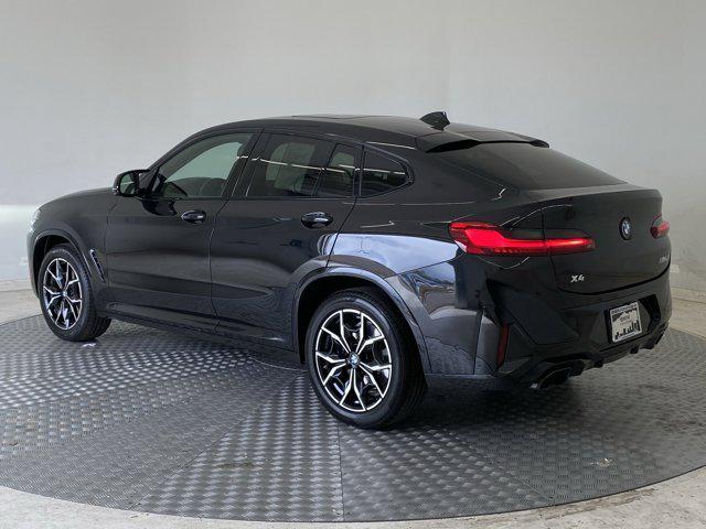 used 2023 BMW X4 car, priced at $55,999