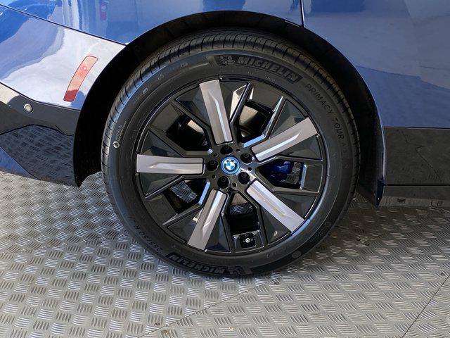 used 2024 BMW iX car, priced at $59,999