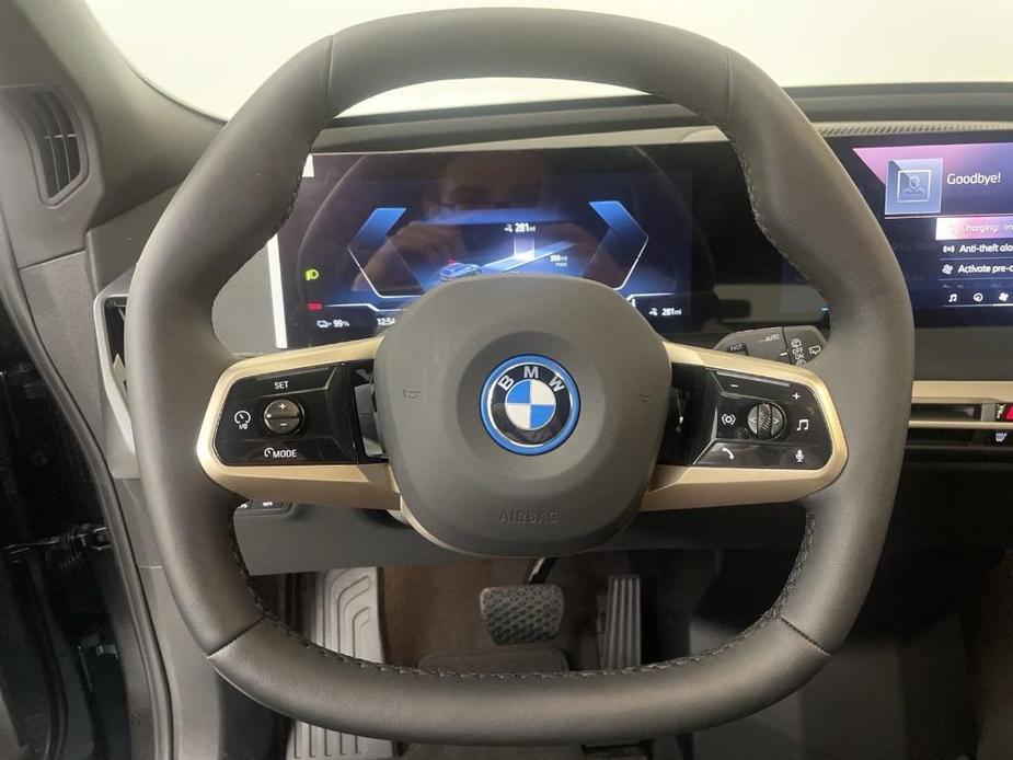 new 2024 BMW iX car, priced at $98,045