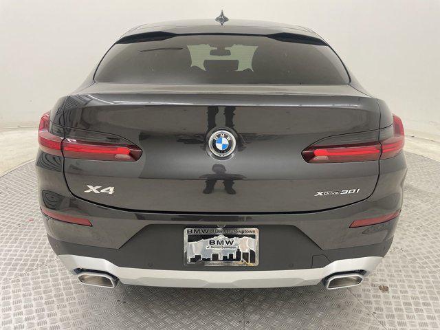 used 2024 BMW X4 car, priced at $57,002