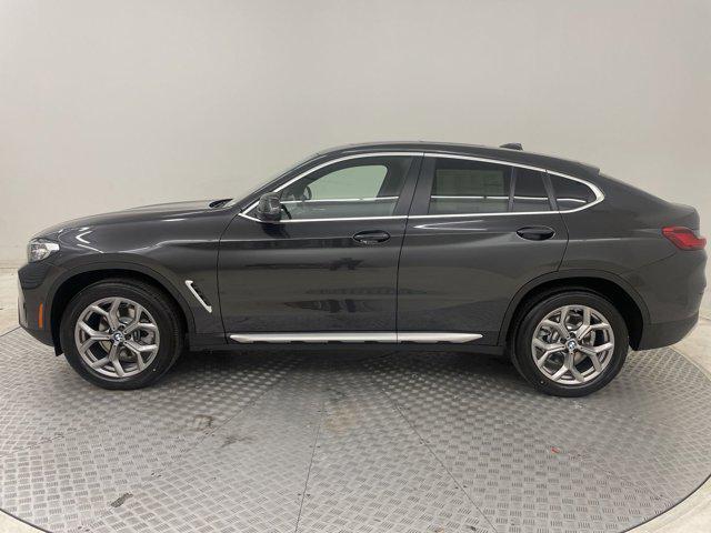 used 2024 BMW X4 car, priced at $57,002