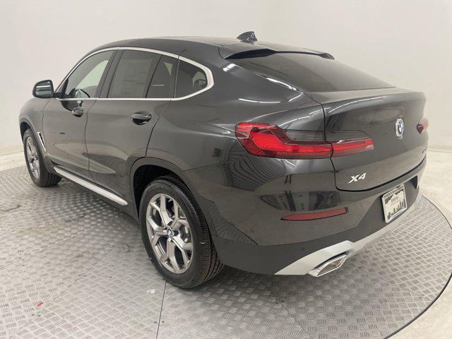 used 2024 BMW X4 car, priced at $57,002