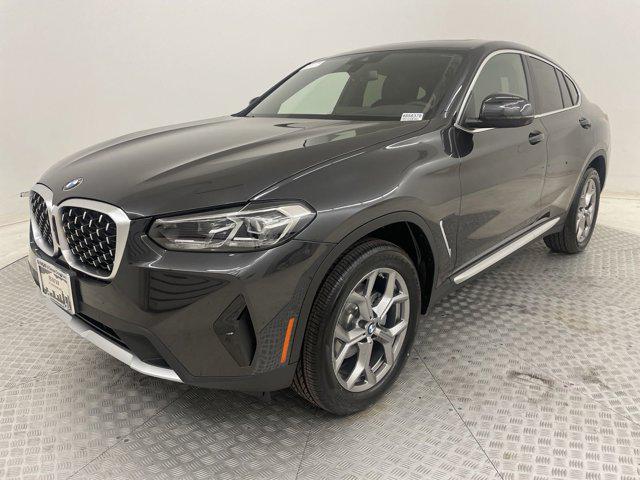 used 2024 BMW X4 car, priced at $57,002