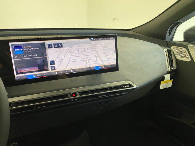 new 2026 BMW iX car, priced at $102,150