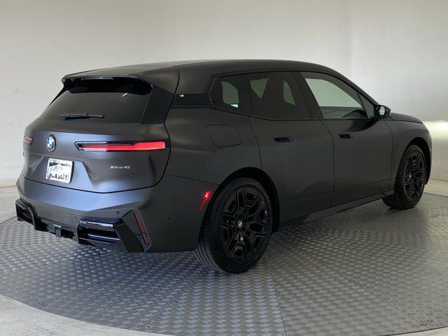 new 2026 BMW iX car, priced at $102,150