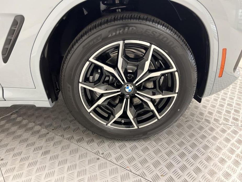 used 2024 BMW iX car, priced at $94,041