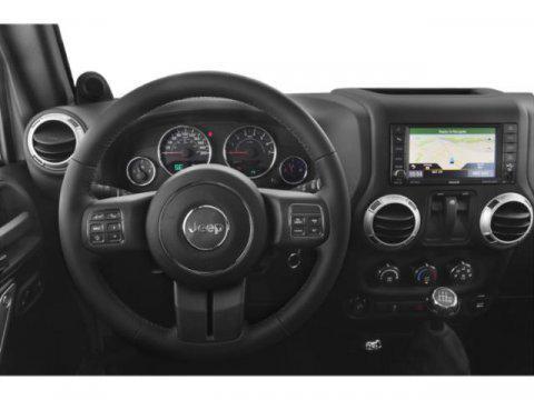used 2015 Jeep Wrangler car, priced at $18,999