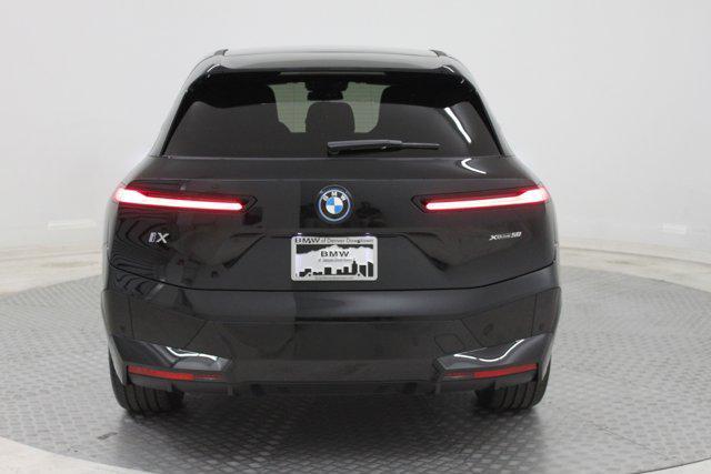 used 2025 BMW iX car, priced at $84,172