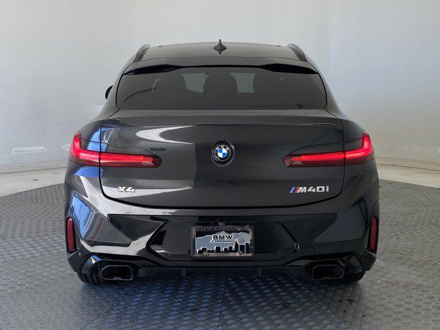 used 2022 BMW X4 car, priced at $48,999