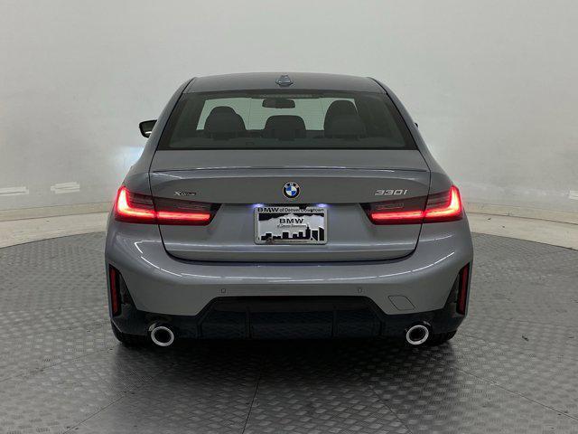 new 2025 BMW 330 car, priced at $53,975