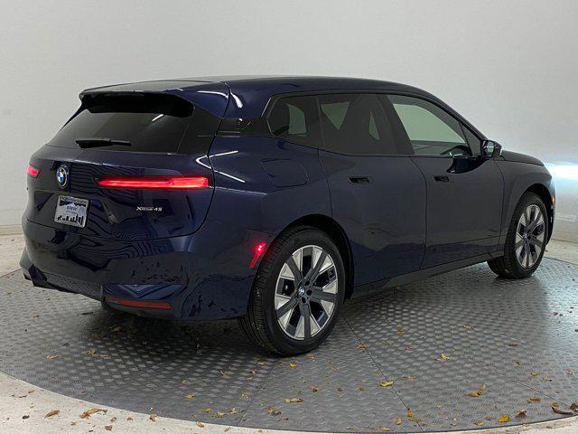 new 2026 BMW iX car, priced at $90,275