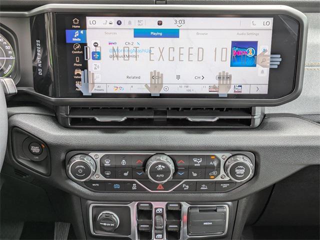 new 2025 Jeep Wrangler 4xe car, priced at $56,049