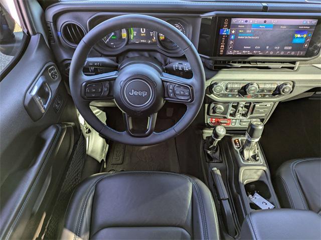 used 2024 Jeep Wrangler 4xe car, priced at $46,990