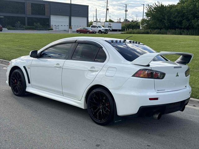 used 2011 Mitsubishi Lancer Evolution car, priced at $23,750