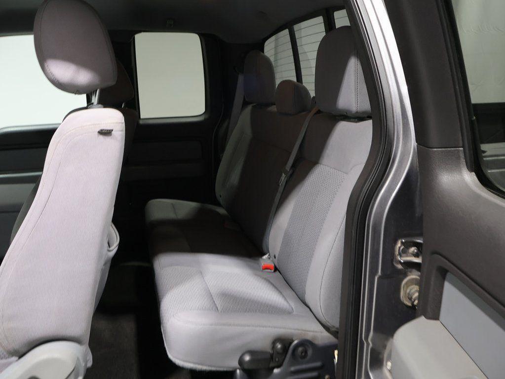 used 2013 Ford F-150 car, priced at $10,000