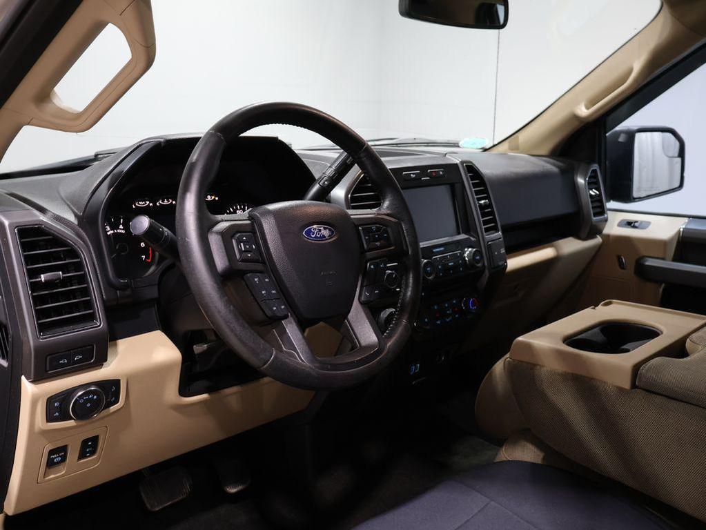 used 2018 Ford F-150 car, priced at $22,452