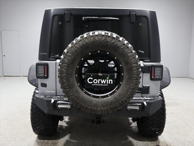 used 2015 Jeep Wrangler Unlimited car, priced at $15,431