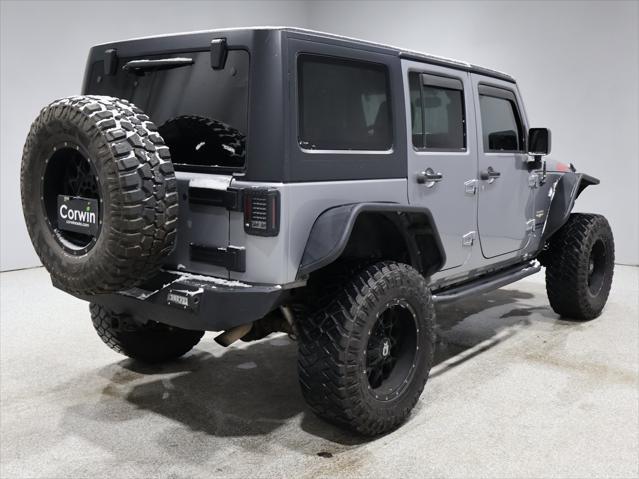 used 2015 Jeep Wrangler Unlimited car, priced at $15,431