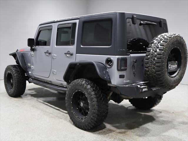 used 2015 Jeep Wrangler Unlimited car, priced at $15,431