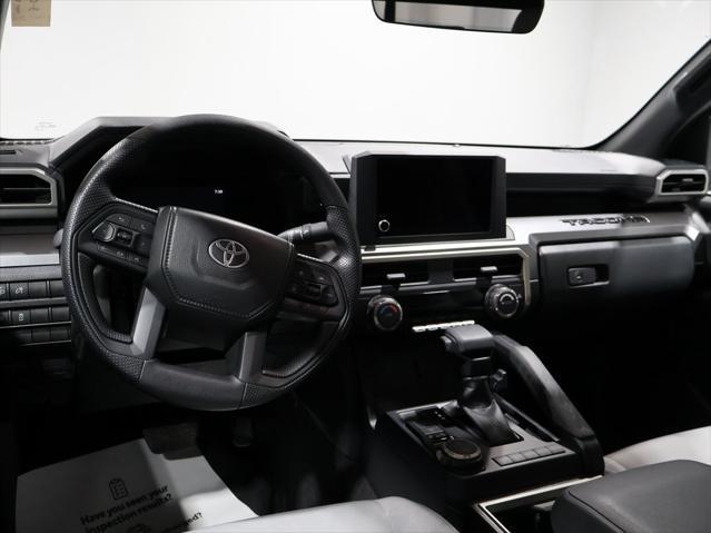 used 2024 Toyota Tacoma car, priced at $40,456