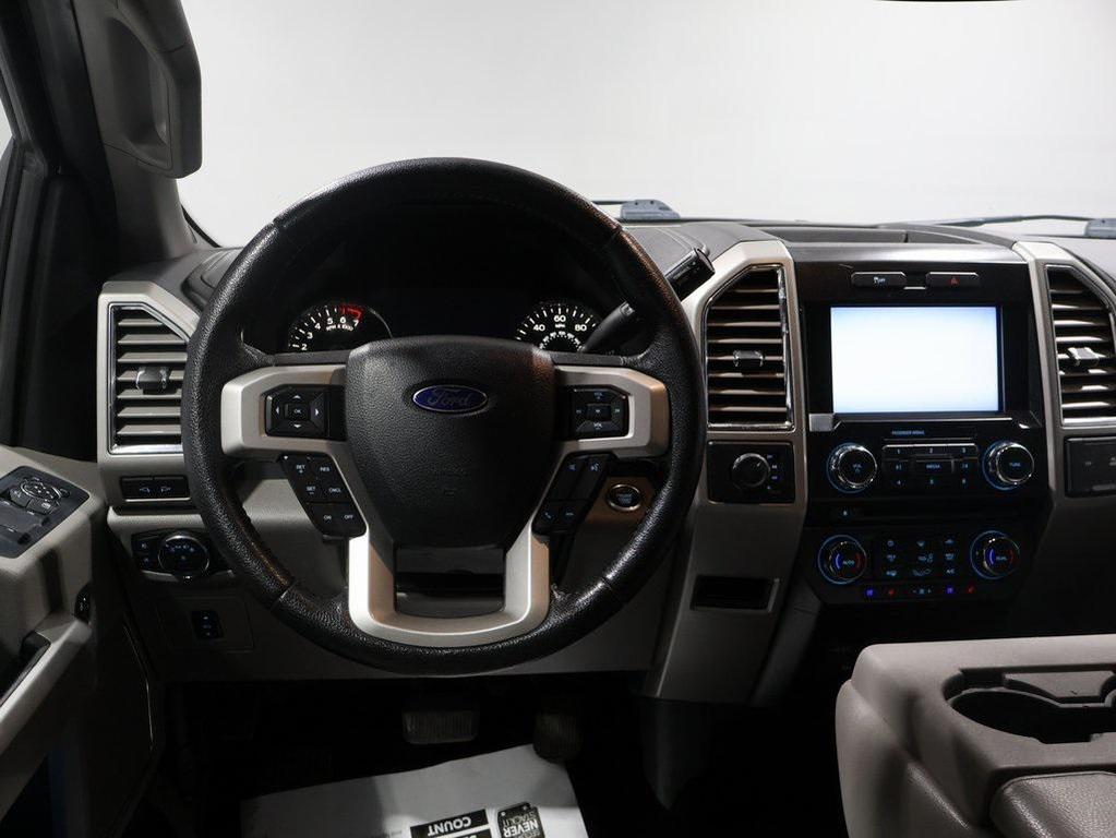 used 2015 Ford F-150 car, priced at $22,124