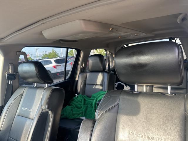used 2012 Nissan Armada car, priced at $4,500