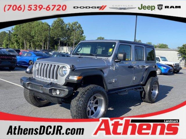 used 2021 Jeep Wrangler Unlimited car, priced at $32,940
