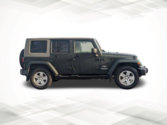 used 2010 Jeep Wrangler Unlimited car, priced at $16,499