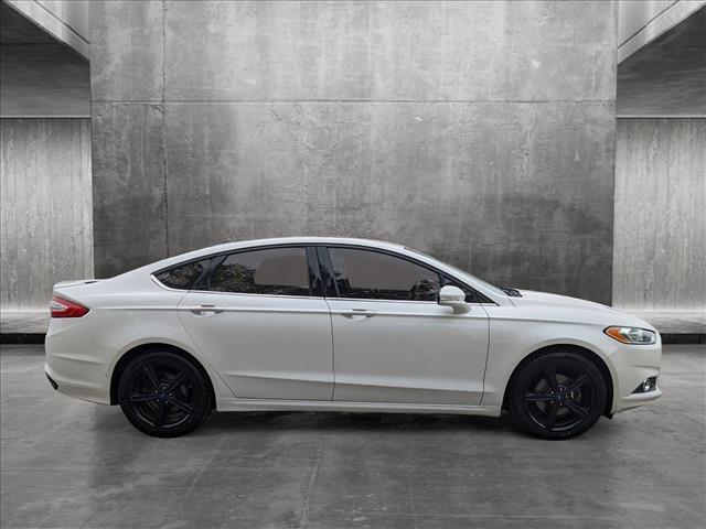 used 2016 Ford Fusion car, priced at $7,395