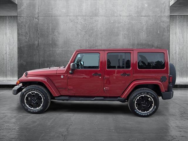 used 2012 Jeep Wrangler Unlimited car, priced at $12,489