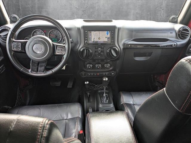 used 2012 Jeep Wrangler Unlimited car, priced at $12,489