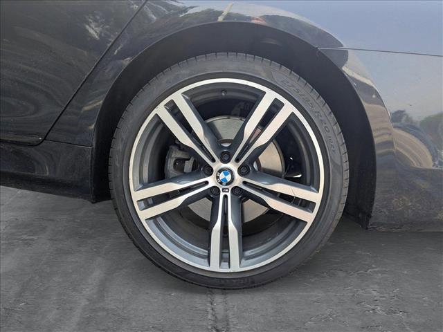 used 2016 BMW 750 car, priced at $22,476