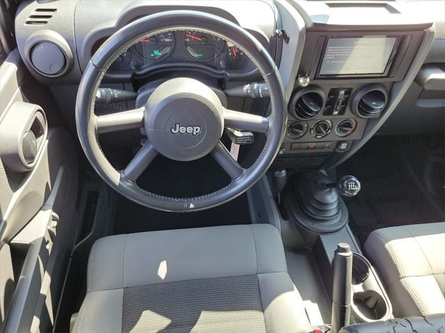 used 2009 Jeep Wrangler Unlimited car, priced at $15,445