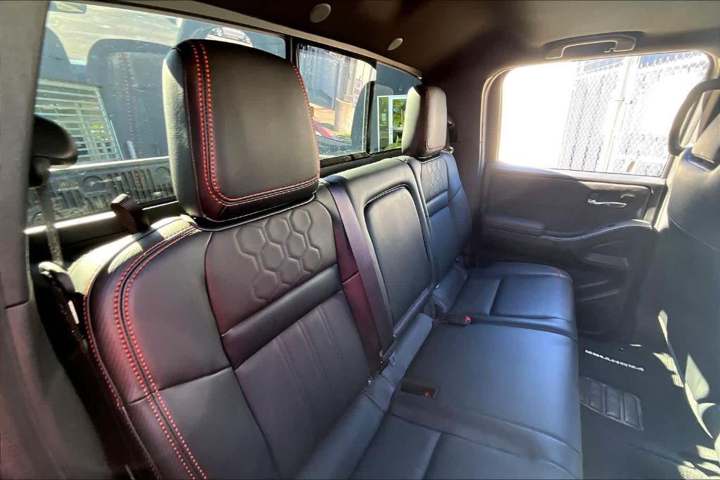 used 2024 Nissan Frontier car, priced at $32,995