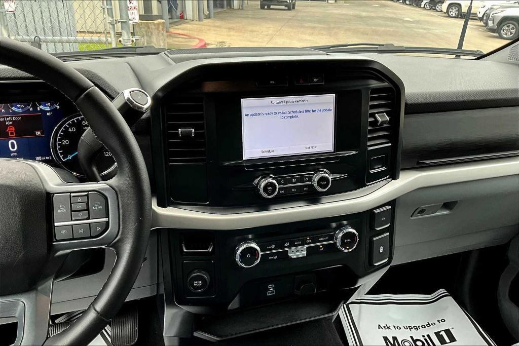 used 2023 Ford F-150 car, priced at $30,599