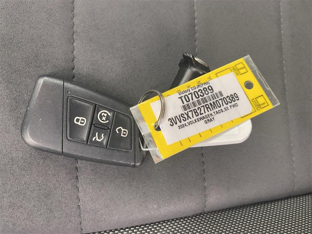 used 2024 Volkswagen Taos car, priced at $18,995