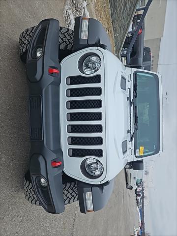 used 2020 Jeep Wrangler Unlimited car, priced at $32,559