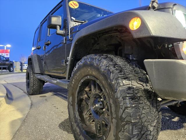 used 2016 Jeep Wrangler Unlimited car, priced at $17,451