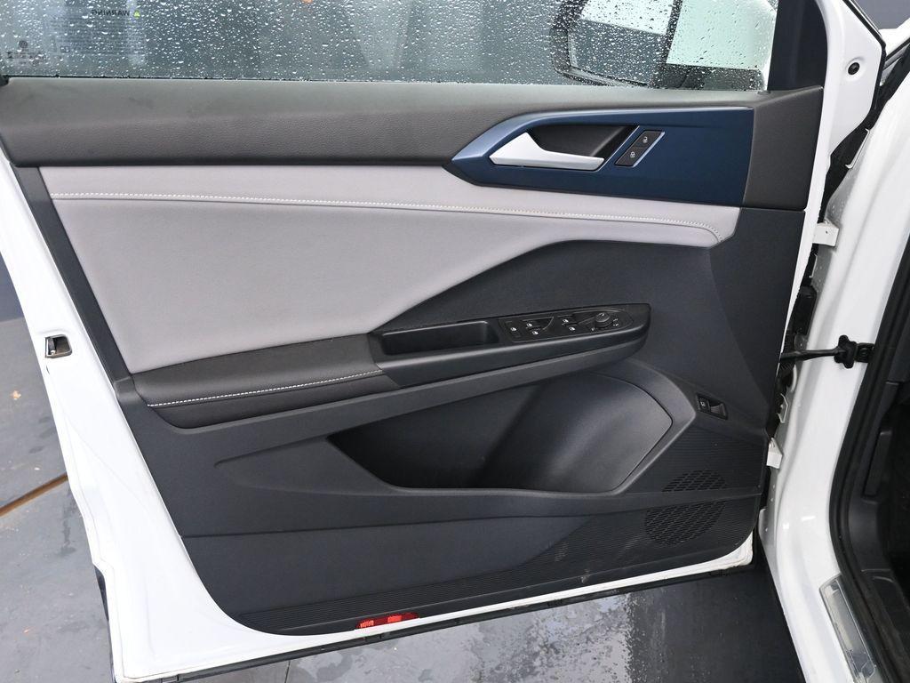 used 2024 Volkswagen Taos car, priced at $23,235