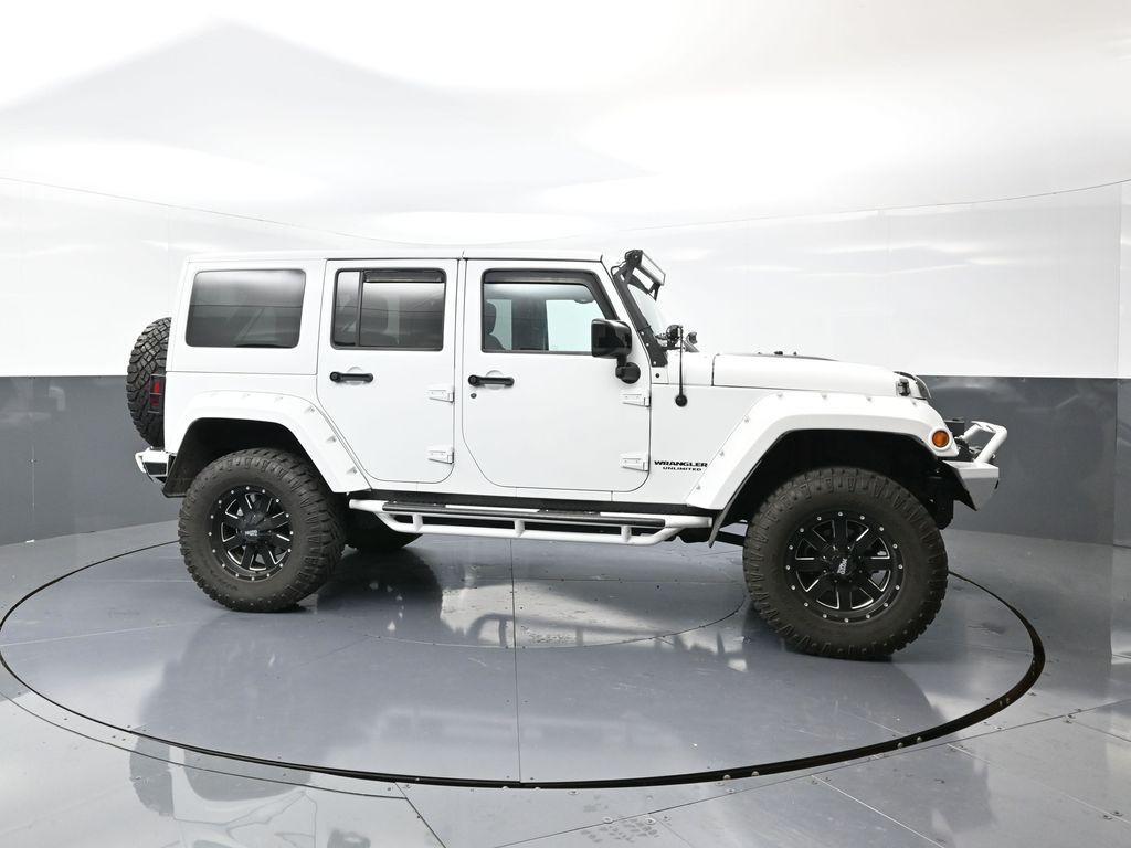 used 2015 Jeep Wrangler Unlimited car, priced at $28,177