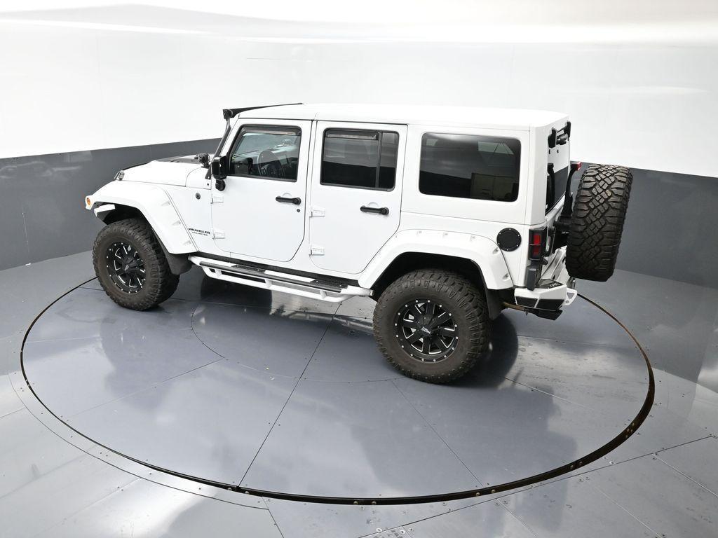 used 2015 Jeep Wrangler Unlimited car, priced at $28,177