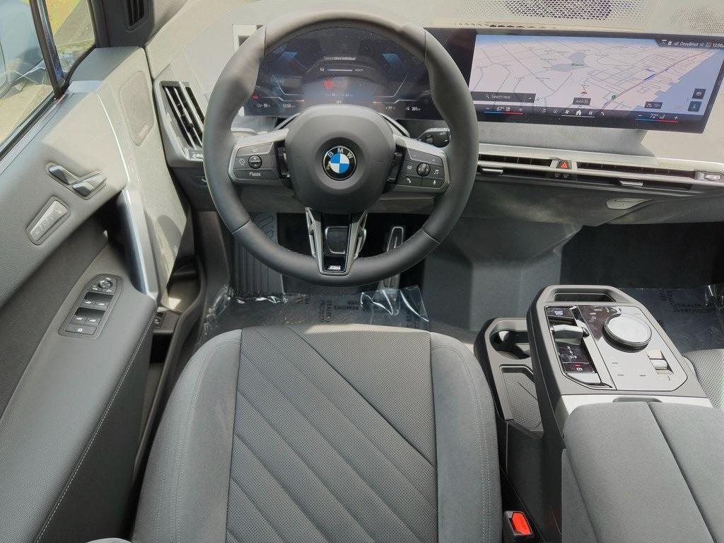 new 2026 BMW iX car, priced at $98,825