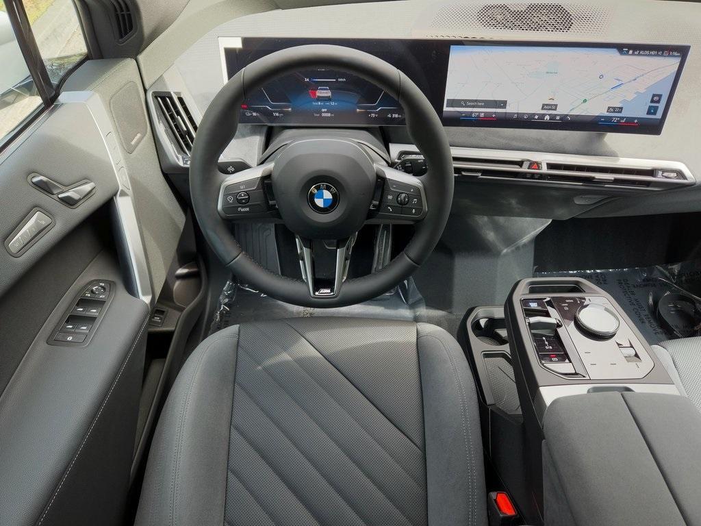 new 2026 BMW iX car, priced at $98,475