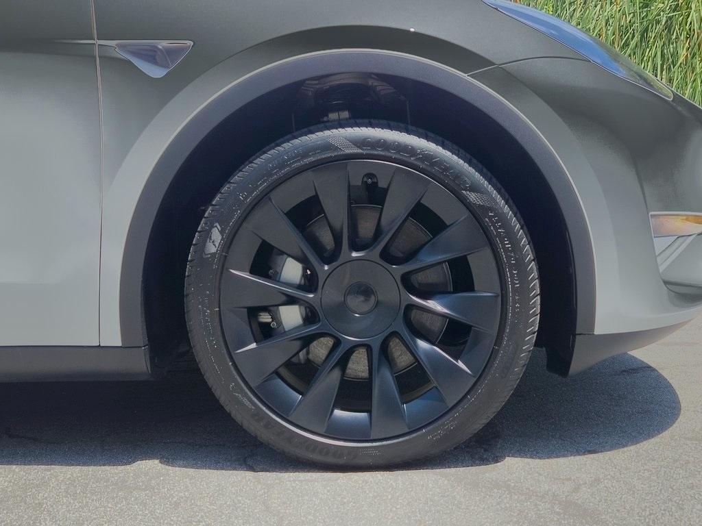 used 2024 Tesla Model Y car, priced at $34,995