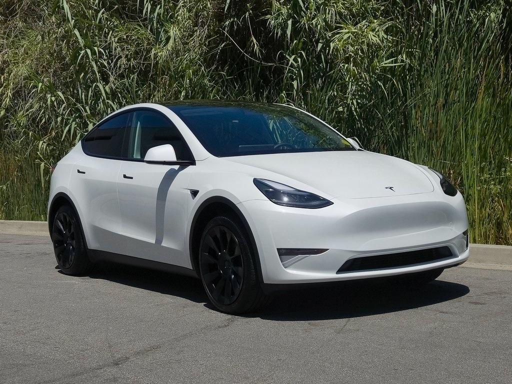 used 2024 Tesla Model Y car, priced at $34,995