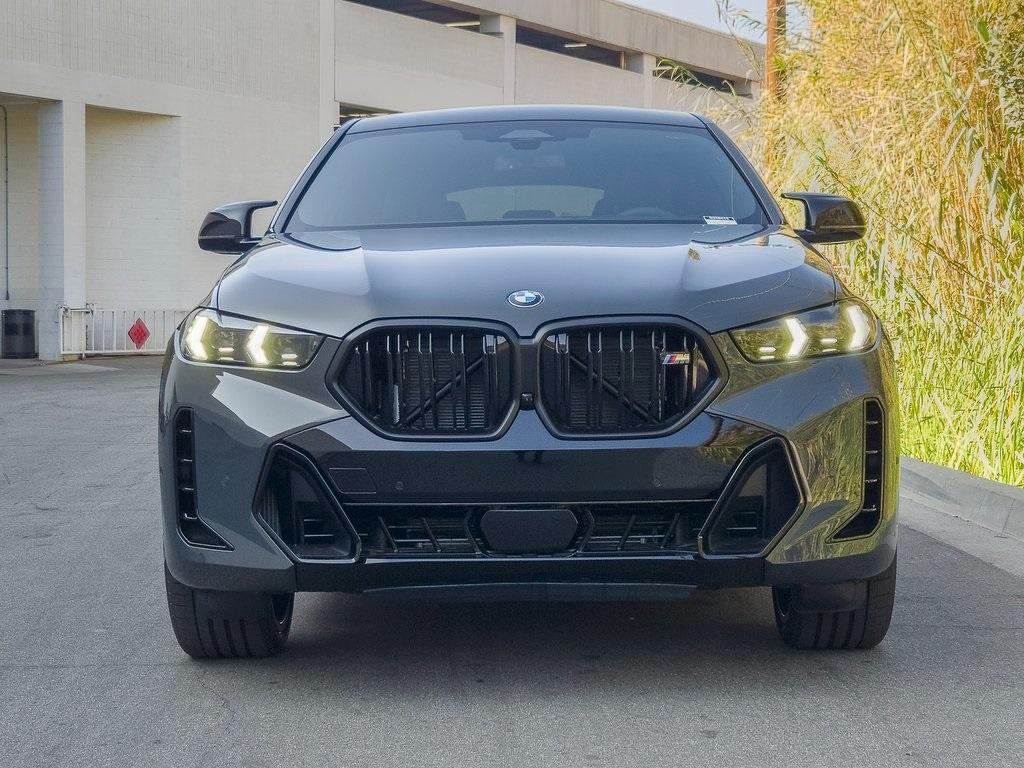 new 2025 BMW X6 car, priced at $103,025